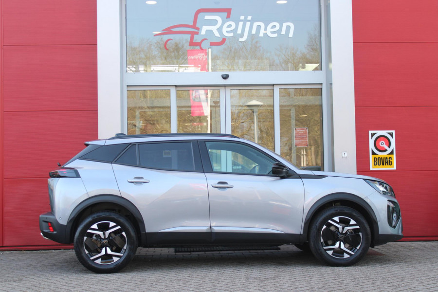 Peugeot 2008 1.2 Hybrid 136PK AUTOMAAT ALLURE | NIEUWE AUTO! | CAMERA VOOR + ACHTER | KEYLESS ENTRY/START | PARKEERSENSOREN VOOR + ACHTER | DODEHOEK DETECTIE | 17" LICHTMETALEN VELGEN | ADAPTIVE CRUISE CONTROL | CLIMATE CONTROL | STOEL VERWARMING | DRAADLOZE APPLE CARPLAY/ANDROID AUTO |