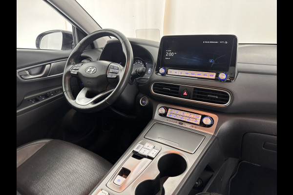Hyundai Kona EV Premium 64 kWh [ 3-Fase ] (INCL-BTW) *HEAT-PUMP | FULL-LEATHER | HEAD-UP | FULL-LED | NAVI-FULLMAP | DAB | ADAPTIVE-CRUISE | KRELL-AUDIO | KEYLESS | CAMERA | BLIND-SPOT | LANE-ASSIST | DIGI-COCKPIT | COMFORT-SEATS | 1