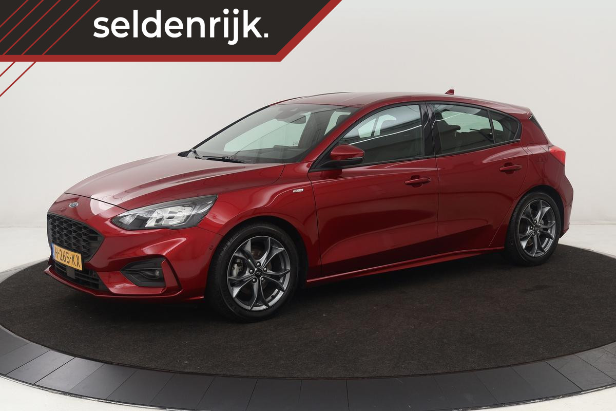 Ford Focus 1.0 EcoBoost ST Line | Head-Up | Trekhaak | Stoel & stuurverwarming | Adaptive cruise | Camera | B&O Sound | Keyless | Carplay | Full LED | Dodehoek detectie | Navigatie | Climate control Ford Focus 1.0 EcoBoost ST Line | Head-Up | Trekhaak | Stoel & stuurverwarming | Adaptive cruise | Camera | B&O Sound | Keyless | Carplay | Full LED | Dodehoek detectie | Navigatie | Climate control