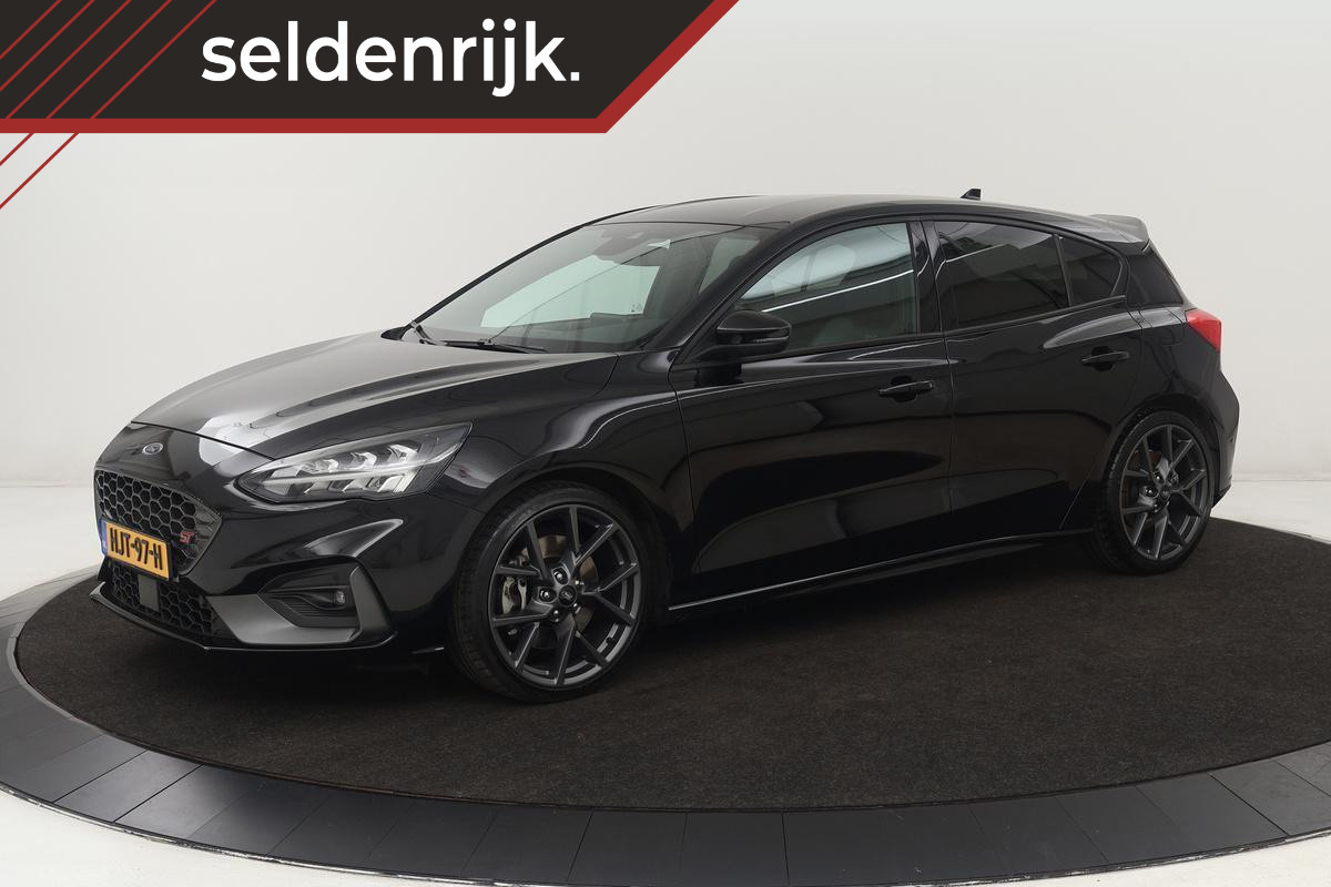 Ford Focus 2.3 EcoBoost ST-3 | Stoel & stuurverwarming | B&O Sound | Recaro Sportstoelen | Carplay | Full LED | Navigatie | Half leder Ford Focus 2.3 EcoBoost ST-3 | Stoel & stuurverwarming | B&O Sound | Recaro Sportstoelen | Carplay | Full LED | Navigatie | Half leder