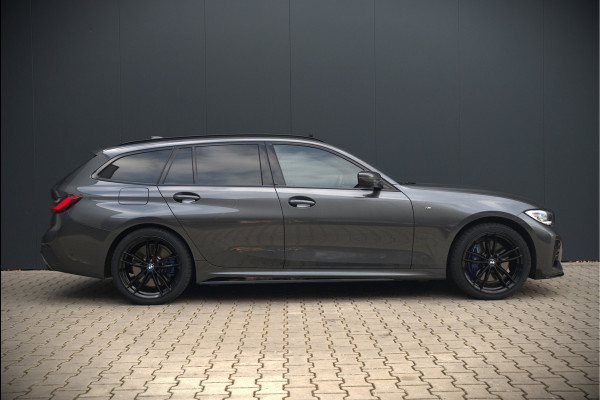 BMW 3 Serie Touring 330e xDrive High Executive M Sport | M Performance | Panoramadak | Harman Kardon | 360° Camera | Assisted Driving | Head Up Display | Stoelverwarming | Stuurverwarming | Apple Carplay | Navigatie | Adaptive Cruise Control | Am