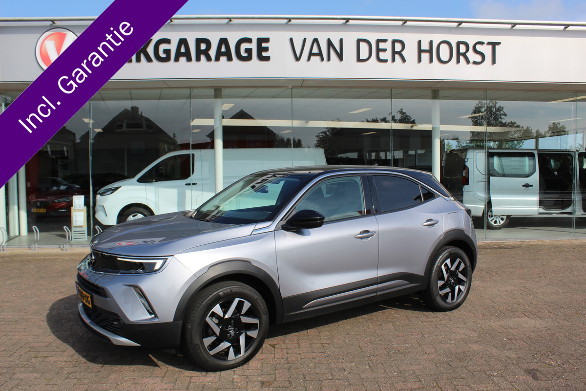 Opel Mokka 1.2-101pk 'Elegance'. Werkelijk in nieuwstaat verkerende nieuwste model Opel Mokka ! Volautm. airco, navigatie, Isofix, telefoonvoorb., metallic lak, LM wielen, digitaal dashboard etc., etc.
