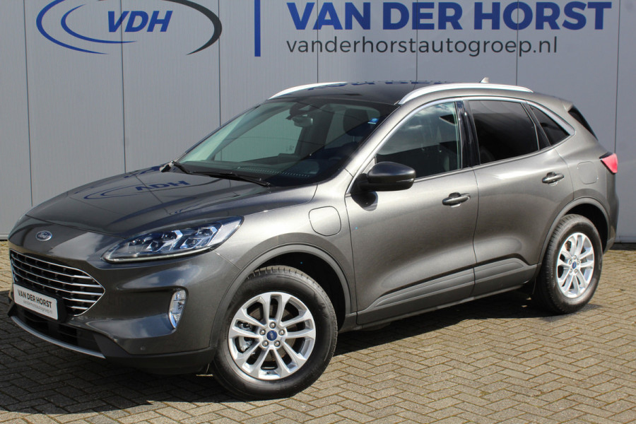 Ford Kuga 2.5-225pk PHEV Titanium X Plug-In Hybrid. Fabr. garantie t/m 07-04-2028 ! Slechts 10.000km ! Autm. airco dual, stoel-, stuur- en voorraamverw., LED verl., B&O soundsyst., metallic lak, cruise control, camera, LM wielen, elektr. achterklep en best. stoel etc.