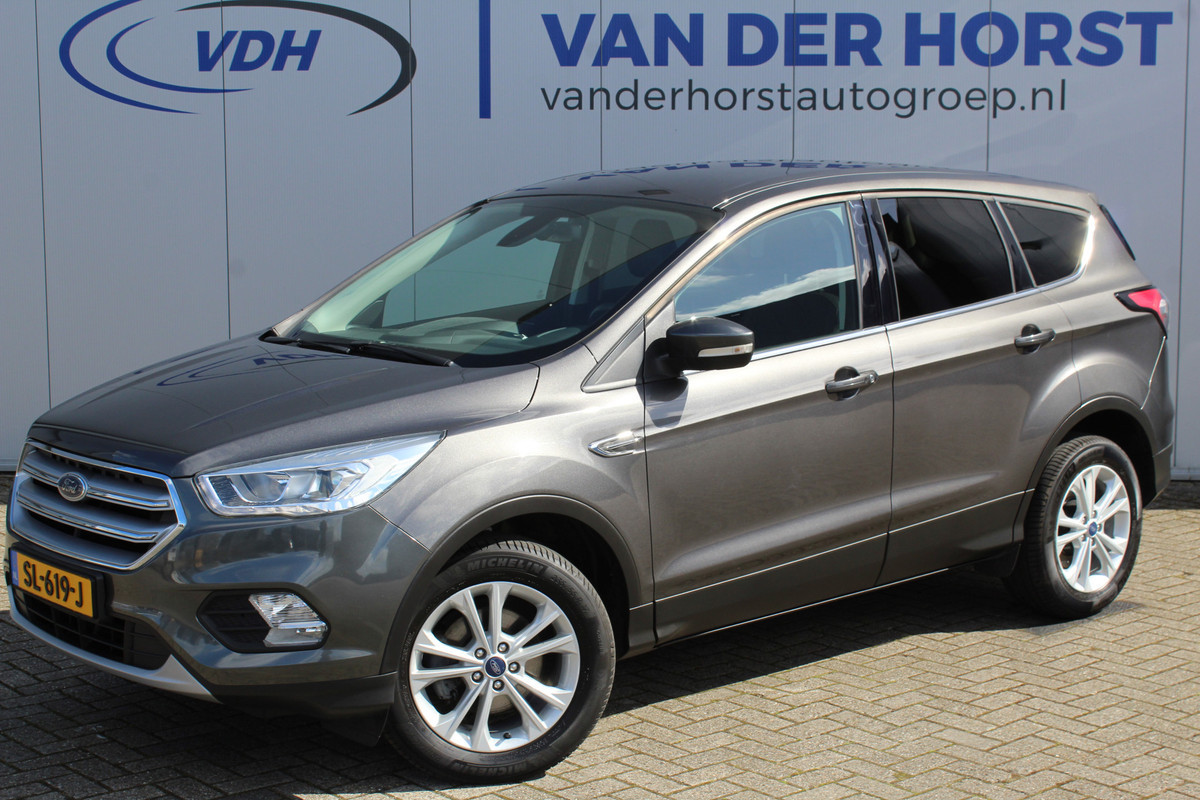 Ford Kuga 1.5-120pk EcoBoost Titanium. Goed onderhouden en erg nette Ford Kuga ! Trekgewicht 1.800kg ! Autm. airco dual, trekhaak, cruise control, metallic lak, voorraamverwarming, LM wielen, parkeersensoren achter, navigatie, telefoonvoorbereiding etc. Ford Kuga 1.5-120pk EcoBoost Titanium. Goed onderhouden en erg nette Ford Kuga ! Trekgewicht 1.800kg ! Autm. airco dual, trekhaak, cruise control, metallic lak, voorraamverwarming, LM wielen, parkeersensoren achter, navigatie, telefoonvoorbereiding etc.