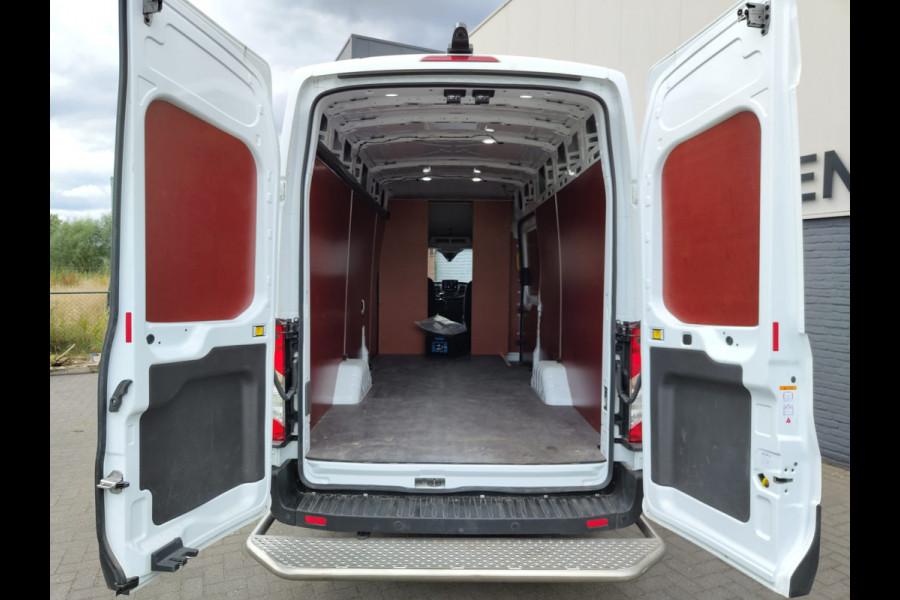 Ford Transit 350 D130pk L4H3 Navi Camera Pdc Apple Carplay Android Airco Cruise Control Voorruit-Verwarmd 2.0TDCI Regensensor DAB Schuifdeur Betonplex Vloer Wandbetimmering Roll Stability Control Led Spoorwisselassist Euro 6 Zeer Compleet!