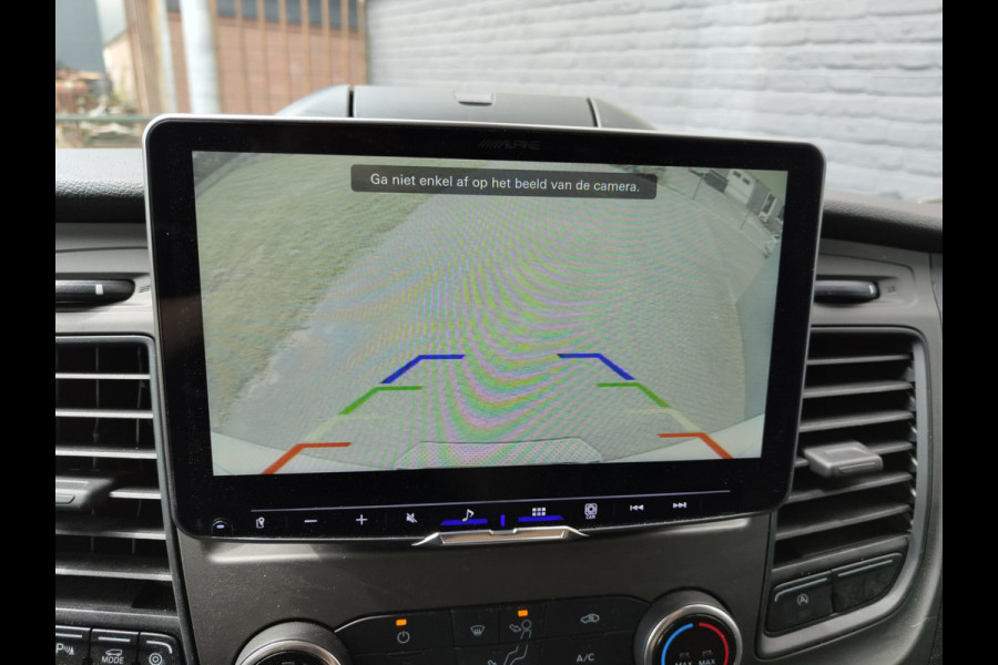 Ford Transit 350 D130pk L4H3 Navi Camera Pdc Apple Carplay Android Airco Cruise Control Voorruit-Verwarmd 2.0TDCI Regensensor DAB Schuifdeur Betonplex Vloer Wandbetimmering Roll Stability Control Led Spoorwisselassist Euro 6 Zeer Compleet!
