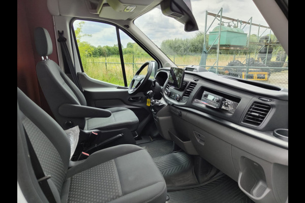 Ford Transit 350 D130pk L4H3 Navi Camera Pdc Apple Carplay Android Airco Cruise Control Voorruit-Verwarmd 2.0TDCI Regensensor DAB Schuifdeur Betonplex Vloer Wandbetimmering Roll Stability Control Led Spoorwisselassist Euro 6 Zeer Compleet!