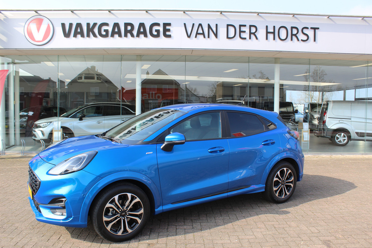 Ford Puma 1.0-125pk EcoBoost Hybrid ST-Line. April 2024 ! Slechts 10.618km ! Autm. airco, navigatie, telefoonvoorb., camera, pdc v+a, parkeerassistent, LED verl., metallic lak, LM wielen, stoel-, stuur- en voorraamverw., lane- en sideassist, adapt. cruise cntrl etc Ford Puma 1.0-125pk EcoBoost Hybrid ST-Line. April 2024 ! Slechts 10.618km ! Autm. airco, navigatie, telefoonvoorb., camera, pdc v+a, parkeerassistent, LED verl., metallic lak, LM wielen, stoel-, stuur- en voorraamverw., lane- en sideassist, adapt. cruise cntrl etc
