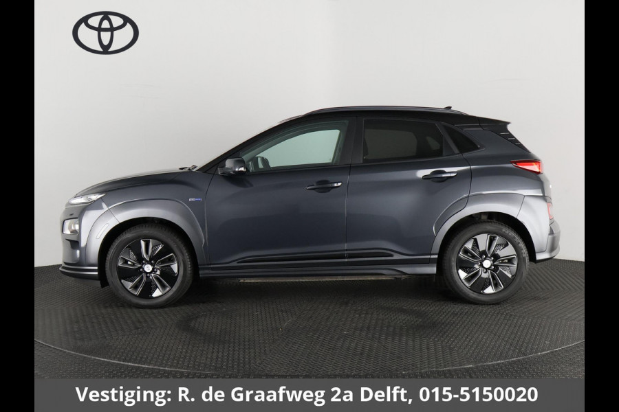 Hyundai Kona EV Premium Two-Tone 64 kWh | Accuconditie: 92% | Navigatie | Leder |