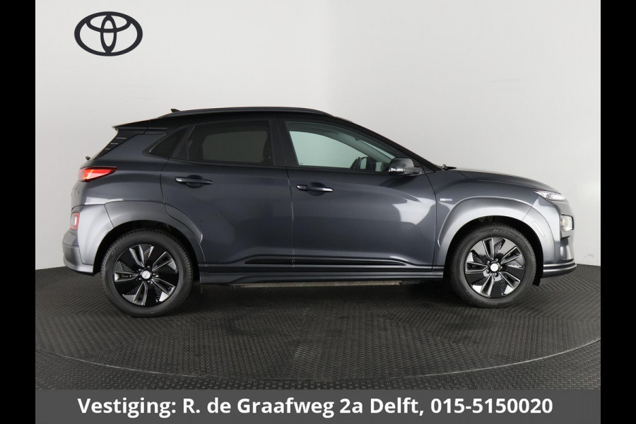 Hyundai Kona EV Premium Two-Tone 64 kWh | Accuconditie: 92% | Navigatie | Leder |