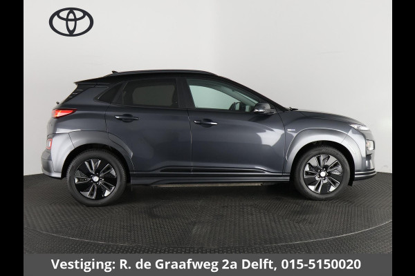 Hyundai Kona EV Premium Two-Tone 64 kWh | Accuconditie: 92% | Navigatie | Leder |