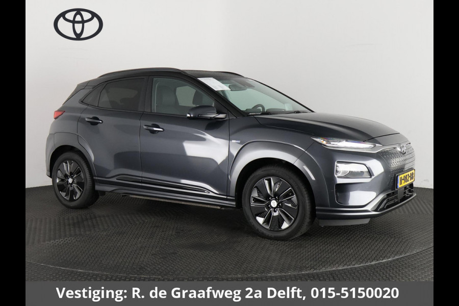 Hyundai Kona EV Premium Two-Tone 64 kWh | Accuconditie: 92% | Navigatie | Leder |
