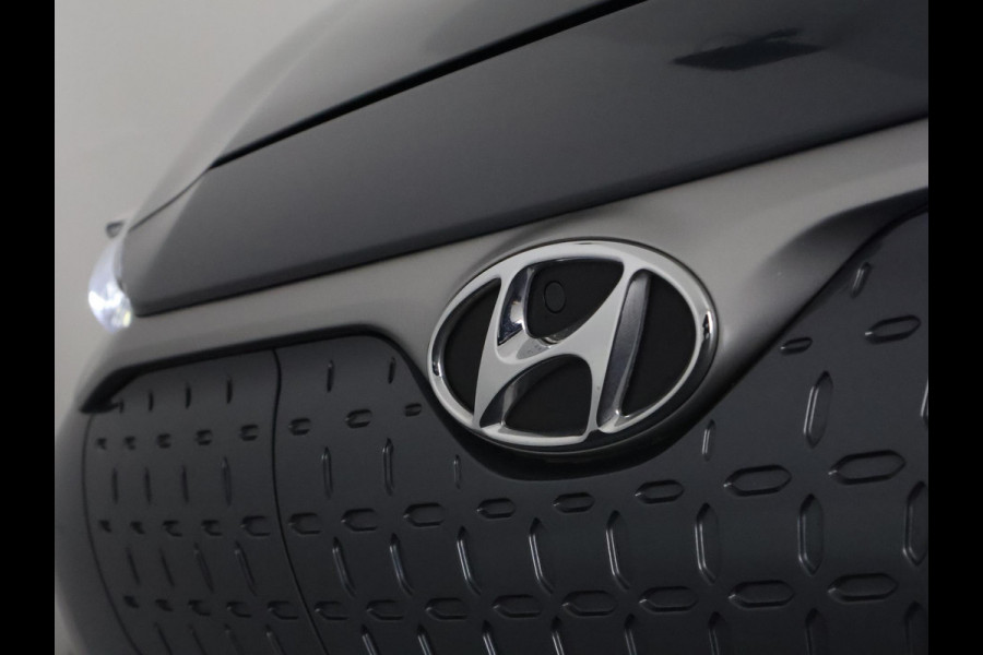 Hyundai Kona EV Premium Two-Tone 64 kWh | Accuconditie: 92% | Navigatie | Leder |