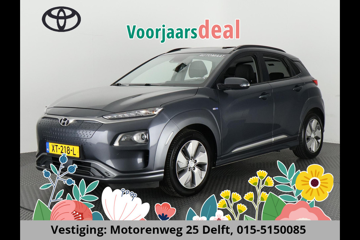 Hyundai Kona EV PREMIUM 204 PK ACCU=100% BERIJK TOT 508 KM !!! Hyundai Kona EV PREMIUM 204 PK PANORAMADAK ACCU=100% 64Kwh. LEER. NAVI. KEYLESS. FULL OPTION. TOT 5 JAAR GARANTIE* Hyundai Kona EV PREMIUM 204 PK ACCU=100% BERIJK TOT 508 KM !!! Hyundai Kona EV PREMIUM 204 PK PANORAMADAK ACCU=100% 64Kwh. LEER. NAVI. KEYLESS. FULL OPTION. TOT 5 JAAR GARANTIE*