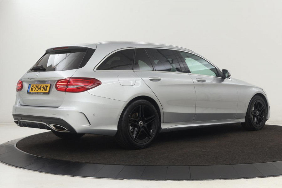 Mercedes-Benz C-Klasse 180 AMG Upgrade Edition | Stoelverwarming | Carplay | Matrix LED | Sfeerverlichting | Leder/Alcantara | Navigatie | DAB | Cruise control | Park Assist