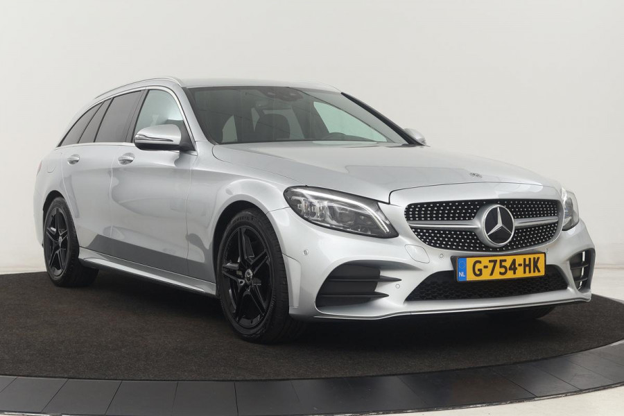 Mercedes-Benz C-Klasse 180 AMG Upgrade Edition | Stoelverwarming | Carplay | Matrix LED | Sfeerverlichting | Leder/Alcantara | Navigatie | DAB | Cruise control | Park Assist