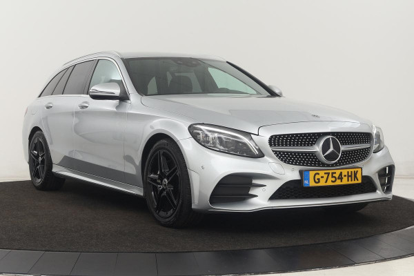 Mercedes-Benz C-Klasse 180 AMG Upgrade Edition | Stoelverwarming | Carplay | Matrix LED | Sfeerverlichting | Leder/Alcantara | Navigatie | DAB | Cruise control | Park Assist