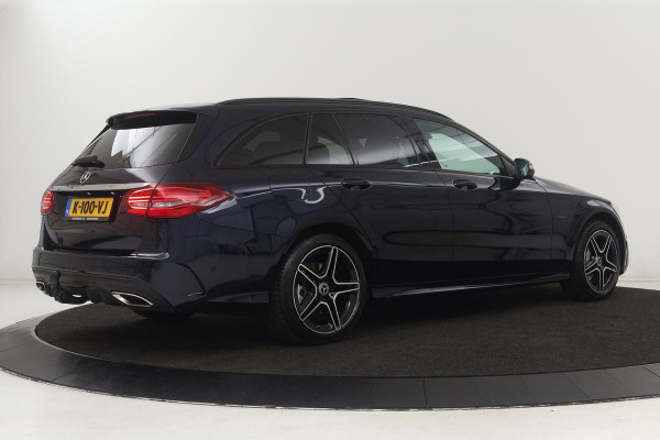 Mercedes-Benz C-Klasse 300e AMG | Panoramadak | Stoelverwarming | 360 camera | Trekhaak | Carplay | Dodehoek detectie | Matrix LED | Navigatie | Half leder