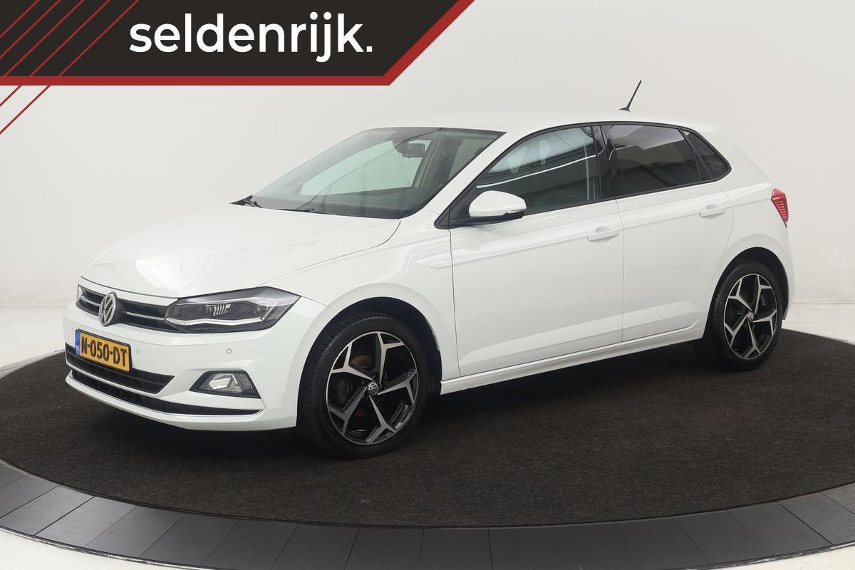 Volkswagen Polo 1.0 TSI Highline | Automaat | Stoelverwarming | Carplay | Navigatie | Climate control | Parkeerhulp | Cruise control | Bluetooth Volkswagen Polo 1.0 TSI Highline | Automaat | Stoelverwarming | Carplay | Navigatie | Climate control | Parkeerhulp | Cruise control | Bluetooth