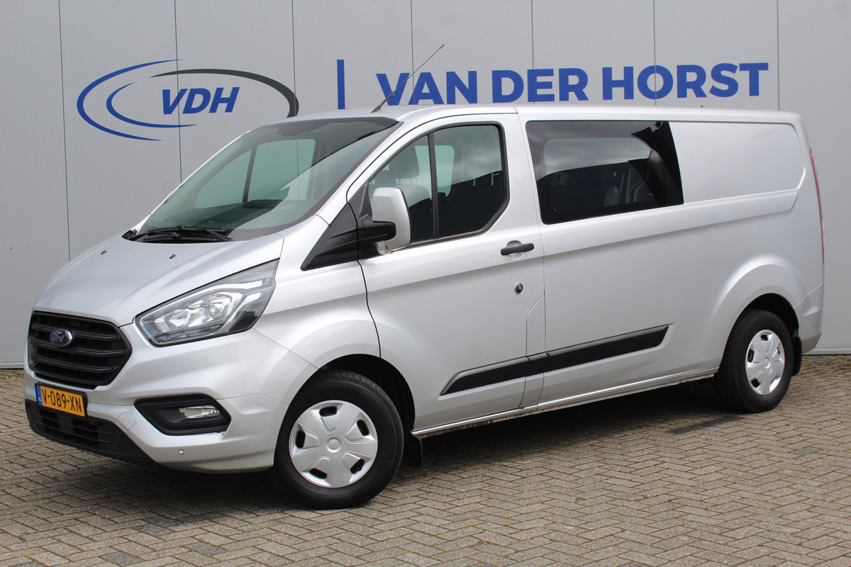 Ford Transit Custom 300 2.0-105pk TDCI L2H1 Trend Dubb. Cab. 6-zits parkeersensoren voor + achter - Bluetooth - Trekhaak - Cruise Control - Airco Ford Transit Custom 300 2.0-105pk TDCI L2H1 Trend Dubb. Cab. 6-zits parkeersensoren voor + achter - Bluetooth - Trekhaak - Cruise Control - Airco