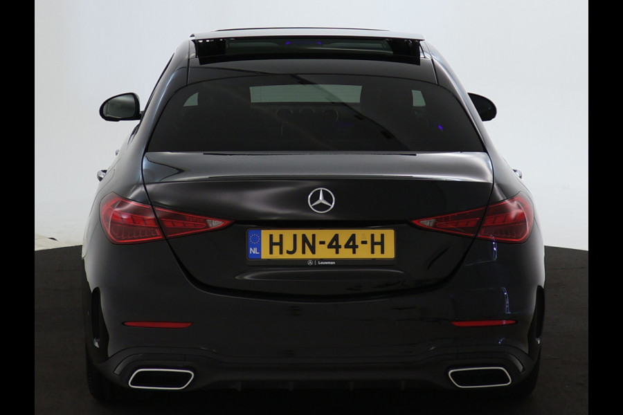 Mercedes-Benz C-Klasse 300 e AMG Plug-In Hybride | Panoramadak | Lichtmetalen velgen | Parking support met camera achter | Navigatie | Inclusief 24 maanden MB Certified garantie voor Europa.