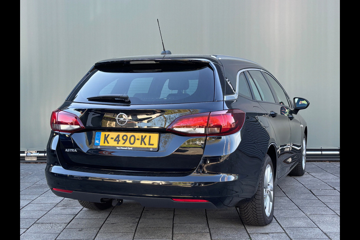 Opel Astra Sports Tourer BWJ 2021 | 1.2 111PK Business Elegance | CLIMA | CAMERA | TREKHAAK | CARPLAY | NAVI | CRUISE | Opel Astra Sports Tourer BWJ 2021 | 1.2 111PK Business Elegance | CLIMA | CAMERA | TREKHAAK | CARPLAY | NAVI | CRUISE |