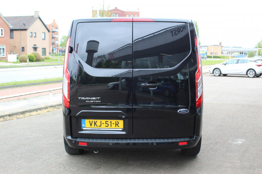 Ford Transit Custom 300 2.0-130pk TDCI L2H1 Limited AUTOMAAT ! Keurige nette en luxe Ford Transit Custom, slechts 47.000km !. Airco, schuifdeur li+re, LM wielen, stoel-, spiegel- en voorraamverw., side en lane assist, 3-zits, navigatie, telefoonvoorb., camera, pdc v+a, cruise cntrl etc.
