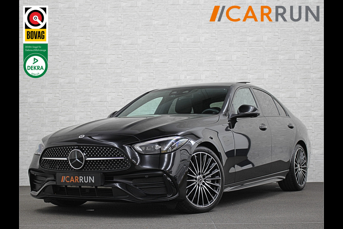 Mercedes-Benz C-Klasse 300 4MATIC AMG-Line | 360 Camera | Panorama | ACC | 19'' | Digital-LED | Night-Pakket | Memory | Trekhaak | Sfeerverlichting | Rij-Assistent Plus | Parfumering | Autom. Parkeren | Carplay | Draadloos Laden | Mercedes-Benz C-Klasse 300 4MATIC AMG-Line | 360 Camera | Panorama | ACC | 19'' | Digital-LED | Night-Pakket | Memory | Trekhaak | Sfeerverlichting | Rij-Assistent Plus | Parfumering | Autom. Parkeren | Carplay | Draadloos Laden |