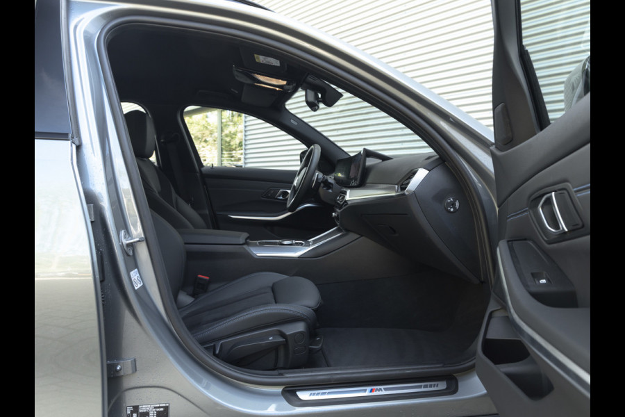 BMW 3 Serie Touring 330e M-Sport - ACC - Trekhaak - Hifi - Stuurwiel verwarmd - Camera