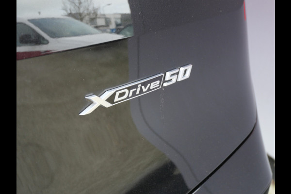 BMW iX xDrive50 BUSINESS ED. PLUS | 112 kWh | PANORAMA | CRYSTAL | TREKHAAK | LUCHTVERING | 1e EIG!!