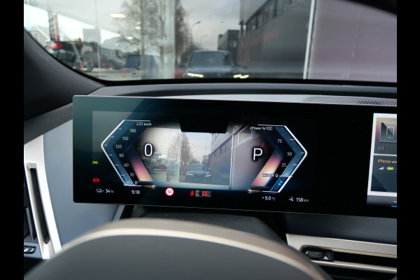 BMW iX xDrive50 BUSINESS ED. PLUS | 112 kWh | PANORAMA | CRYSTAL | TREKHAAK | LUCHTVERING | 1e EIG!!