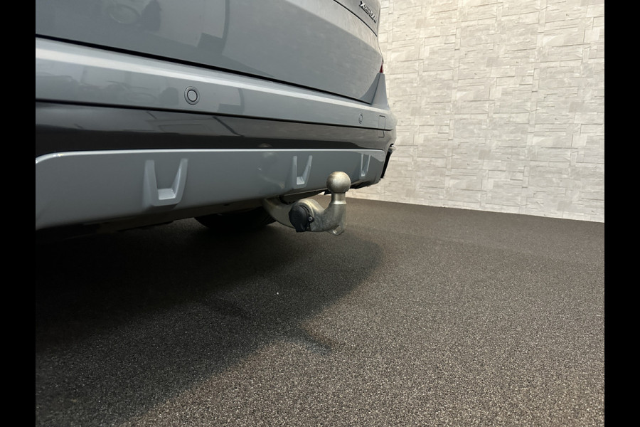 BMW X5 50e M-Sport Pro | 360 Camera | ACC | Carbon | Softclose | Head-Up | Stoelventilatie | Iconic-Glow | Harman-Kardon | Stuur, Stoelverwarming V+A | 4-Zone Clima | Keyless-Entry | Trekhaak | Ambient-Air | Indiv. Leder | Beker Koeling/Verwarmd | M-Gordels | 22'' | Iso-Glas |