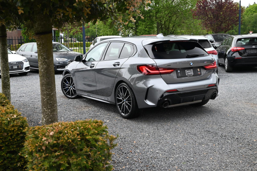 BMW 1-serie M135i xDrive High Executive Color Vision 306 PK Dealer o.h Harman Kardon Camera 19''