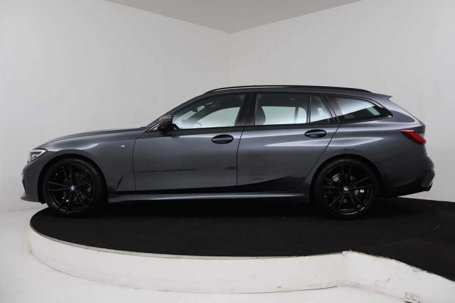 BMW 3 Serie Touring 320i High Executive (PANORAMADAK, TREKHAAK WEGKLAPBAAR, CAMERA, NAVIGATIE, NL-AUTO, DEALER ONDERHOUDEN)