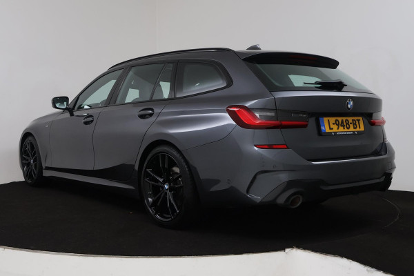BMW 3 Serie Touring 320i High Executive (PANORAMADAK, TREKHAAK WEGKLAPBAAR, CAMERA, NAVIGATIE, NL-AUTO, DEALER ONDERHOUDEN)