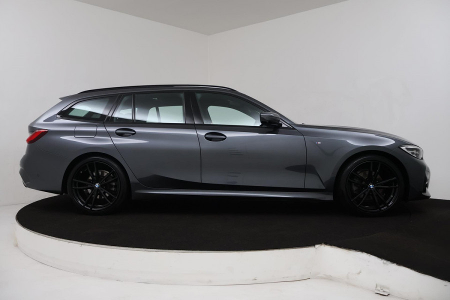BMW 3 Serie Touring 320i High Executive (PANORAMADAK, TREKHAAK WEGKLAPBAAR, CAMERA, NAVIGATIE, NL-AUTO, DEALER ONDERHOUDEN)