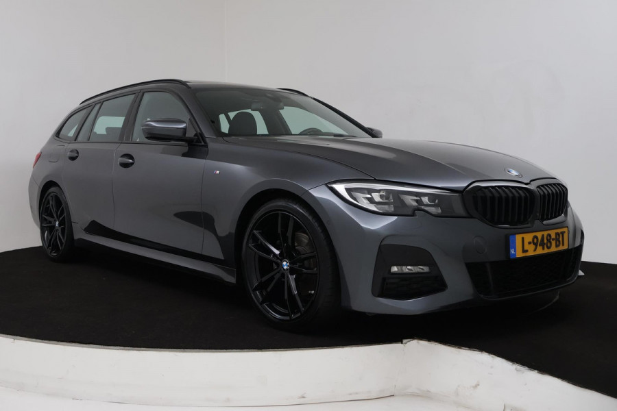 BMW 3 Serie Touring 320i High Executive (PANORAMADAK, TREKHAAK WEGKLAPBAAR, CAMERA, NAVIGATIE, NL-AUTO, DEALER ONDERHOUDEN)