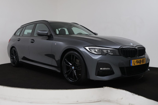 BMW 3 Serie Touring 320i High Executive (PANORAMADAK, TREKHAAK WEGKLAPBAAR, CAMERA, NAVIGATIE, NL-AUTO, DEALER ONDERHOUDEN)