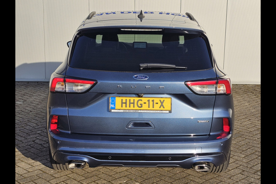Ford Kuga 2.5-225pk PHEV ST-Line X Plug-in Hybrid. Garantie t/m 04-02-2028 ! Slechts 5.500km ! Volautm. airco dual, elektr. achterklep, LM wielen, stuur-, stoel- en voorraamverwarming, camera v+a,  side- en lane assist, adaptieve cruise cntrl, metallic lak, etc.