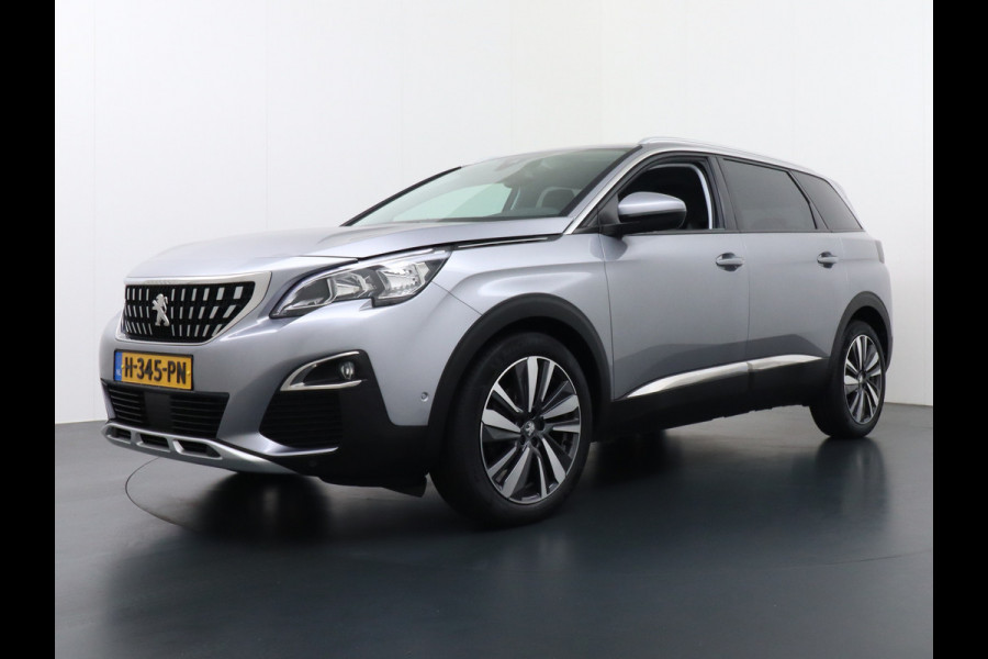 Peugeot 5008 T131PK 7-Pers Apple Carplay Android Adap.Cruise Navi Camera Trekhaak Led Elek.Achterklep Ecc Pdc DAB+ Pack Drive Assist Plus Dodehoek detectie Lane Assist Keyless Lmv 19" Verkeersbordlezer Privacy Glas Blue Premium 100% Dealeronderhouden! EURO6 Laatste beurt gehad bij 98.204km/13/1/2025!