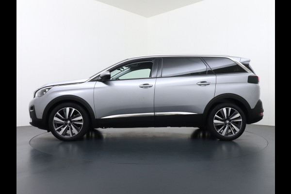 Peugeot 5008 T131PK 7-Pers Apple Carplay Android Adap.Cruise Navi Camera Trekhaak Led Elek.Achterklep Ecc Pdc DAB+ Pack Drive Assist Plus Dodehoek detectie Lane Assist Keyless Lmv 19" Verkeersbordlezer Privacy Glas Blue Premium 100% Dealeronderhouden! EURO6 Laatste beurt gehad bij 98.204km/13/1/2025!