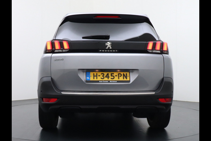 Peugeot 5008 T131PK 7-Pers Apple Carplay Android Adap.Cruise Navi Camera Trekhaak Led Elek.Achterklep Ecc Pdc DAB+ Pack Drive Assist Plus Dodehoek detectie Lane Assist Keyless Lmv 19" Verkeersbordlezer Privacy Glas Blue Premium 100% Dealeronderhouden! EURO6 Laatste beurt gehad bij 98.204km/13/1/2025!