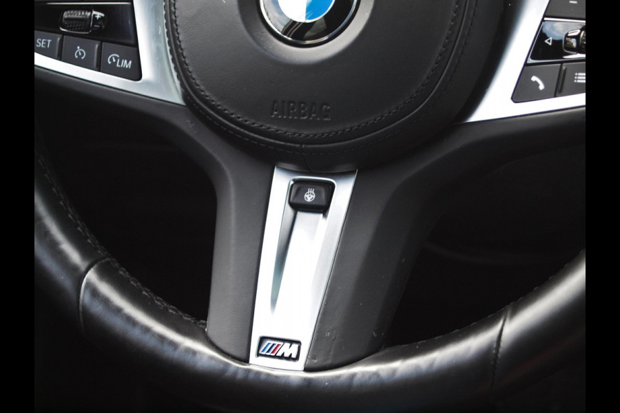BMW 1-serie 120i Business Edition | Panoramadak | Camera | Apple Carplay | M-pakket | Schaalstoelen |