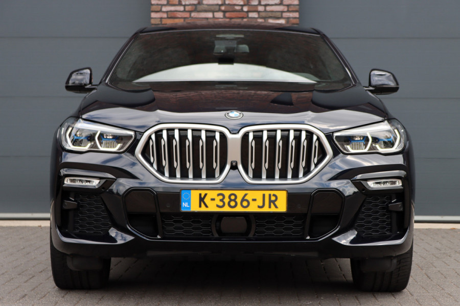 BMW X6 xDrive40i High Executive M Sport Aut8 | ACC | Carbon | Panoramadak | Memory | Surround Camera | Iconic Glow | Laser | HUD | Merino Leder | Trekhaak | Verwarmd Stuurwiel |