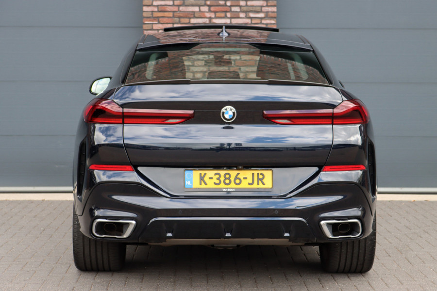 BMW X6 xDrive40i High Executive M Sport Aut8 | ACC | Carbon | Panoramadak | Memory | Surround Camera | Iconic Glow | Laser | HUD | Merino Leder | Trekhaak | Verwarmd Stuurwiel |