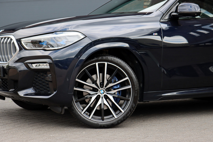 BMW X6 xDrive40i High Executive M Sport Aut8 | ACC | Carbon | Panoramadak | Memory | Surround Camera | Iconic Glow | Laser | HUD | Merino Leder | Trekhaak | Verwarmd Stuurwiel |