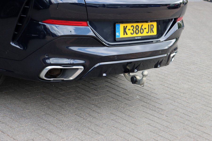 BMW X6 xDrive40i High Executive M Sport Aut8 | ACC | Carbon | Panoramadak | Memory | Surround Camera | Iconic Glow | Laser | HUD | Merino Leder | Trekhaak | Verwarmd Stuurwiel |