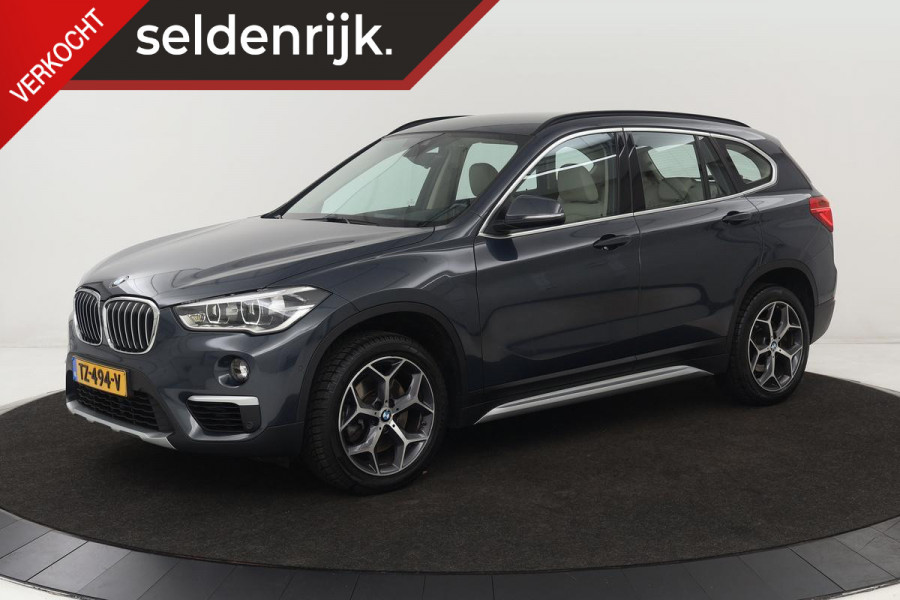 BMW X1 sDrive20i Orange Edition II | Leder | Stoelverwarming | Head-Up | Full LED | Sportstoelen | Navigatie | Park Assist | Bluetooth