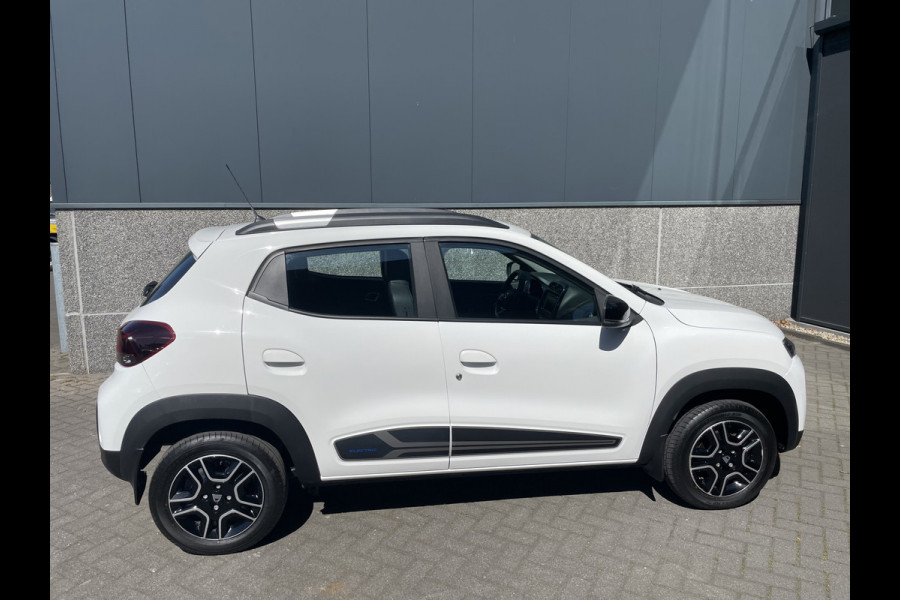 Dacia Spring Comfort Plus (Orange Pack) 27 kWh Mistlampen - Achteruitrijcamera - Airco - Navigatie - Cruise control - Parkeersensoren achter - Dakrails