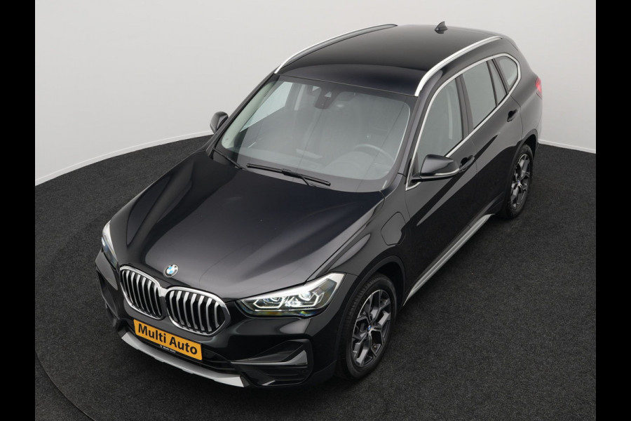 BMW X1 xDrive25e X Line Plug In Hybrid 221pk Dealer O.H. PHEV | Sportstoelen Verwarmd | Adaptive Cruise | Navigatie | Sfeerverlichting | Climate Control | DAB | LED Koplampen | L.M. 18" |